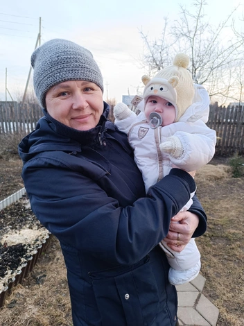 С маленьким Костей | Источник: архив семьи Коняевых