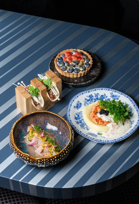 Сет бара Morgan. На деревянной подставке тако с говядиной | Источник: new.foodfestival.ru