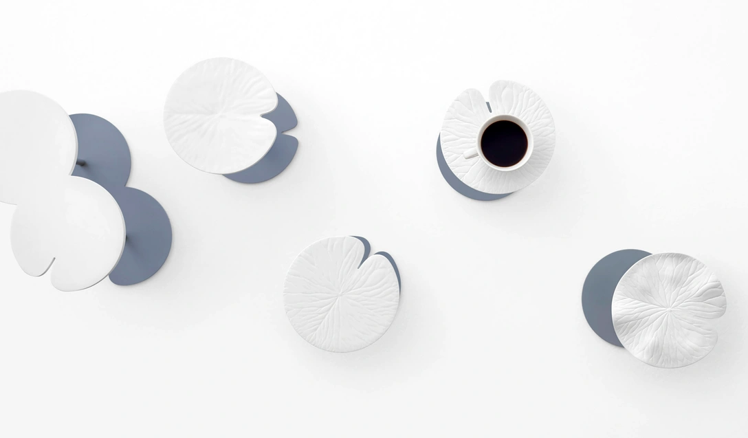 Белое братство: столики и цветы из Севрского фарфора от Nendo (фото 0)