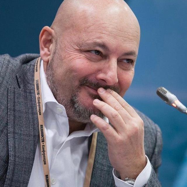 <p>Евгений Коган</p>