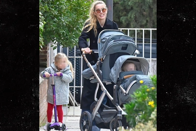 Эмбер Херд сияет, а Джонни Депп снимается в Голливуде