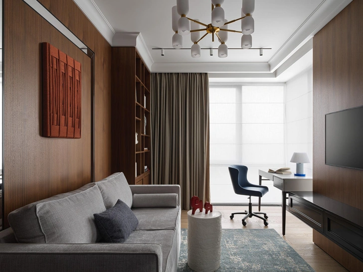 Кабинет. Панно над диваном, Backbone buro. Столик, Levadnaja ceramics. Настольная лампа, Normann Copenhagen, L’Appartement. | Источник: Сергей Красюк. Стиль: Yes We May