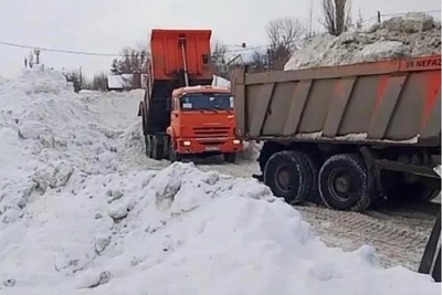 Snow with dirt and de-icing agents dumped on Zaton beach