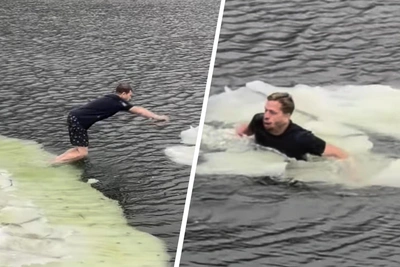 Tourists Float on Ice Floe in Arctic Lake