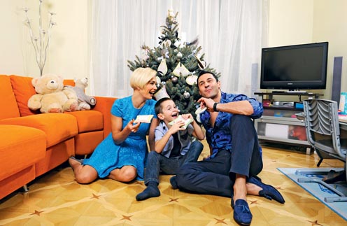 Стас Костюшкин с женой Юлей и сыном Богданом