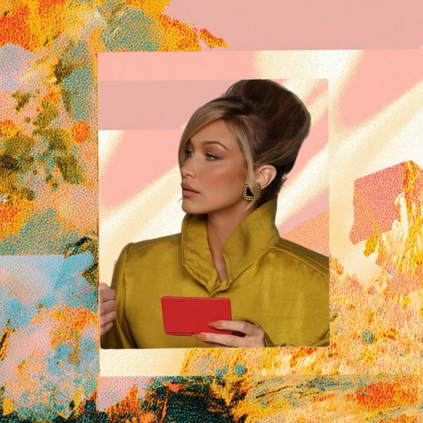 Пучок в стиле 60-х: как повторить стильную укладку Беллы Хадид на зиму 2025/26 | Источник: theGirl