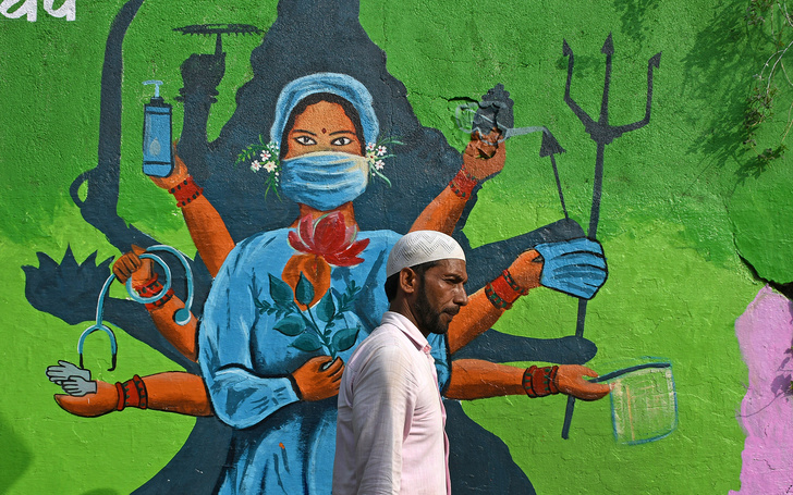 Фото №17 - Лучшие граффити про коронавирус со всего мира
