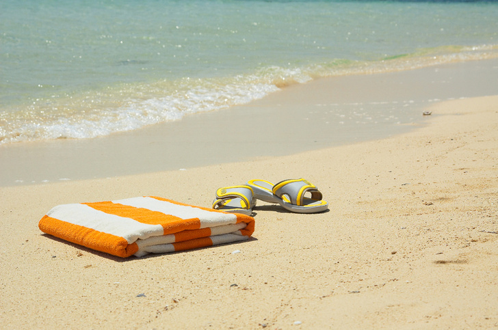 Желто-полосатое пляжное полотенце - главный символ курортного Египта