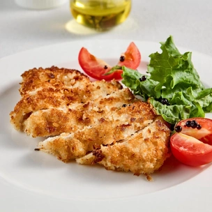 Сочная курица в хрустящей корочке из пармезана: легкий рецепт ужина, от которого будут в восторге все гости