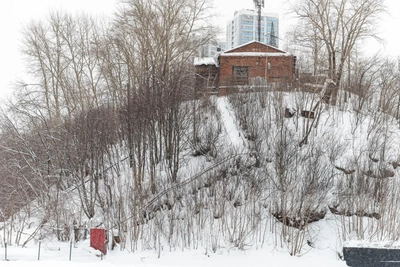 Mysterious red house without an address stands on a hill at the Shpagin Plant
