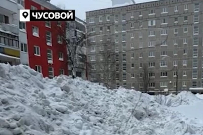 Tractor Buried Boy in Snow, Only Hand Visible