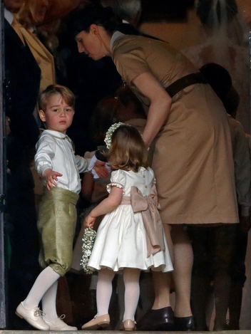 Мария вместе с принцем Джорджем и принцессой Шарлоттой на свадьбе их тети Пиппы Миддлтон, 20 мая 2017