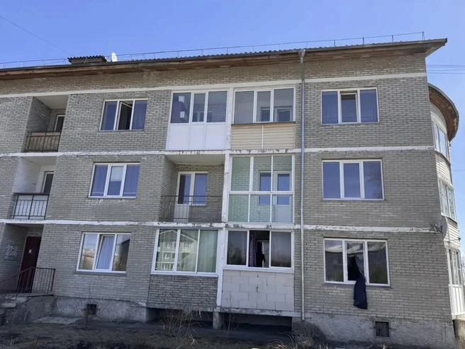 Дом, в котором произошел пожар | Источник: ГСУ СК России по Красноярскому краю и РХ / MAX