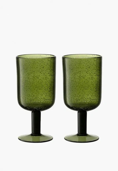 Набор бокалов для вина FlowiБокалы от бренда Liberty Jones привлекают внимание необычным дизайном. Изделия выполнены вручную из переработанного стекла, поэтому их размеры, а также рисунок пузырьков будут отличаться от фото: сами пузырьки могут быть разного размера и формы, а также могут образовывать неравномерные скопления. Это создает эффект настоящего потока воды, застывшего в стенке бокала.