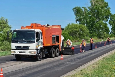 Участок трассы «Амур» обрабатывают технологией «Сларри Сил»