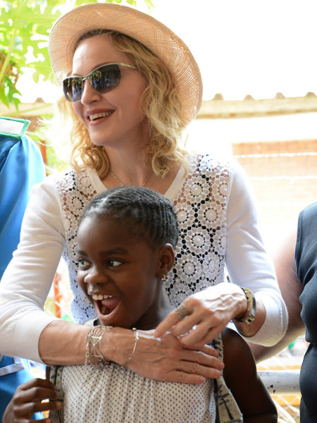 Мадонна и ее приемные дети