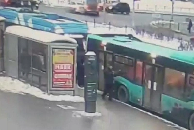 Ambulance Crashes onto Sidewalk After Impact