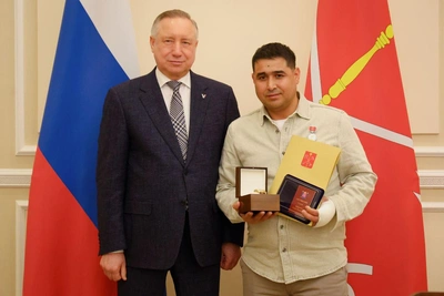 Дворник получил награду губернатора за спасение ребенка