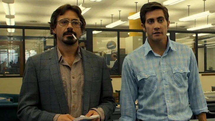 Репортер в исполнении Роберта Дауни мл. и Джейк Джилленхол в роли карикатуриста | Источник: Кадр из фильма «Зодиак»