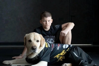 12-year-old Kudo fighter and his Labrador in a kimono win social media fame