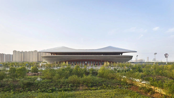 Бюро Zaha Hadid Architects завершило стадион в Сиане | Источник: Hufton + Crow 