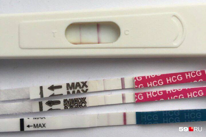 Бледная полоска на тесте на беременность - причины, последствия. Простыми словами