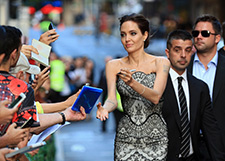 Анджелина Джоли и Брэд Питт на премьере драмы  «Несломленный»