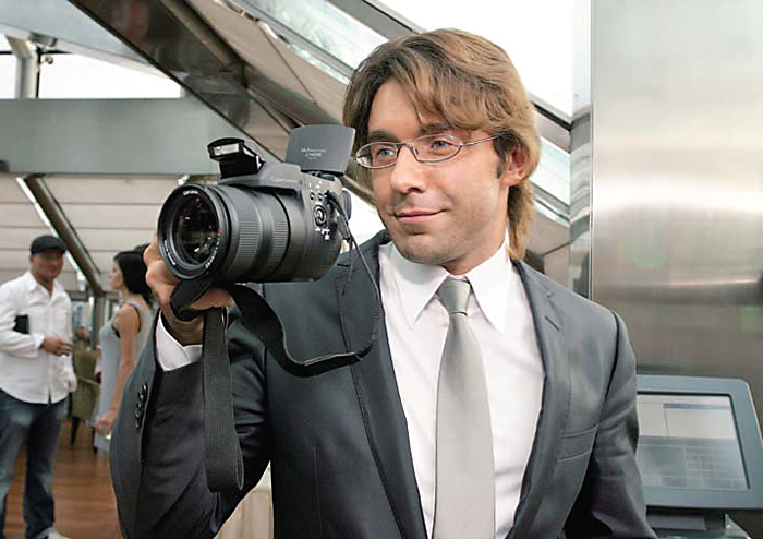 Обложка первого номера Star Hit; Андрей Малахов со своим фотоаппаратом.