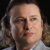 <p>Онур Акай</p>