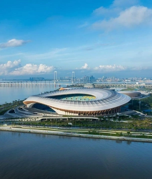 Бюро Zaha Hadid Architects достроило стадион и спортивный центр в Гуанчжоу
