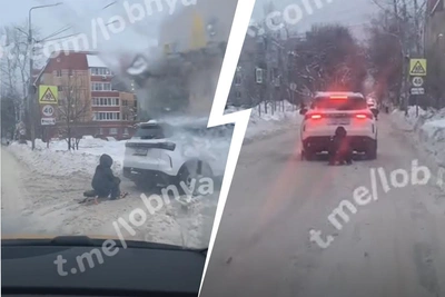 Ребенка на снегокате привязали к машине в Лобне