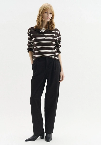 Черные брюки&nbsp;&mdash; снова база, но есть нюансы