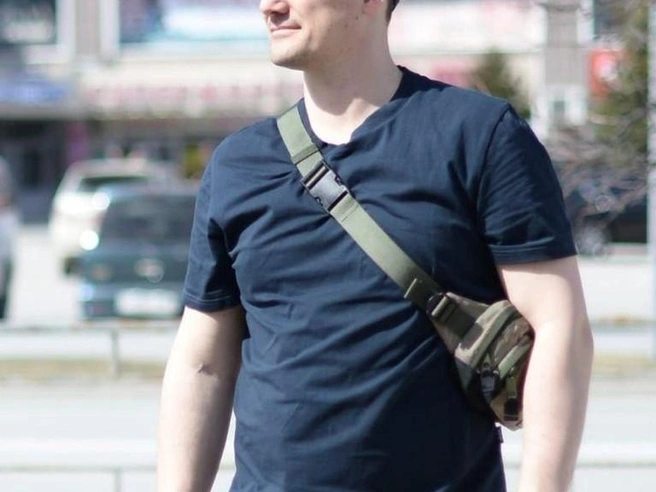 Спасение одного из детей Денисом Епонешниковым | Источник: Пресс-служба МЧС по Новосибирской области