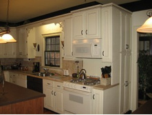 painting-kitchen-cupboards-white-300x225.jpg