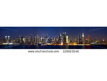Stock-photo-manhattan-skyline-panorama-with-times-square-lights-at-dusk-new-york-city-129023246.jpg
