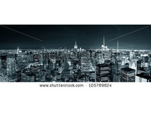 Stock-photo-new-york-city-manhattan-skyline-at-night-panorama-black-and-white-with-urban-skyscrapers-105789824.jpg