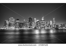 Stock-photo-black-and-white-night-view-of-manhattan-skyline-and-east-river-173367428.jpg