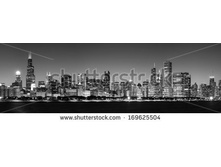 Stock-photo-panoramic-view-of-chicago-skyline-at-night-in-black-and-white-169625504.jpg