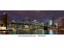 Stock-photo-new-york-city-manhattan-and-brooklyn-bridge-at-dusk-93723517.jpg