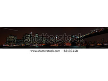 Stock-photo-a-panoramic-view-of-the-financial-district-skyline-of-new-york-city-photographed-from-the-brooklyn-62130448.jpg
