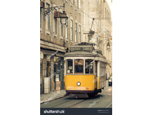 Stock-photo-vintage-tram-in-the-city-center-of-lisbon-portugal-374749189.jpg