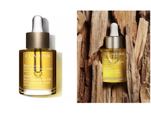 Clarins Santal ����� ��� ���� ��� ����� � �������������� ����, 30 ��. ���� 2599 �.