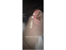 http://www.aliexpress.com/item/1pc-New-hot-leaf-simulated-pearl-dangle-charm-lady-clip-ear-cuff-earrings-E0490/571008034.html